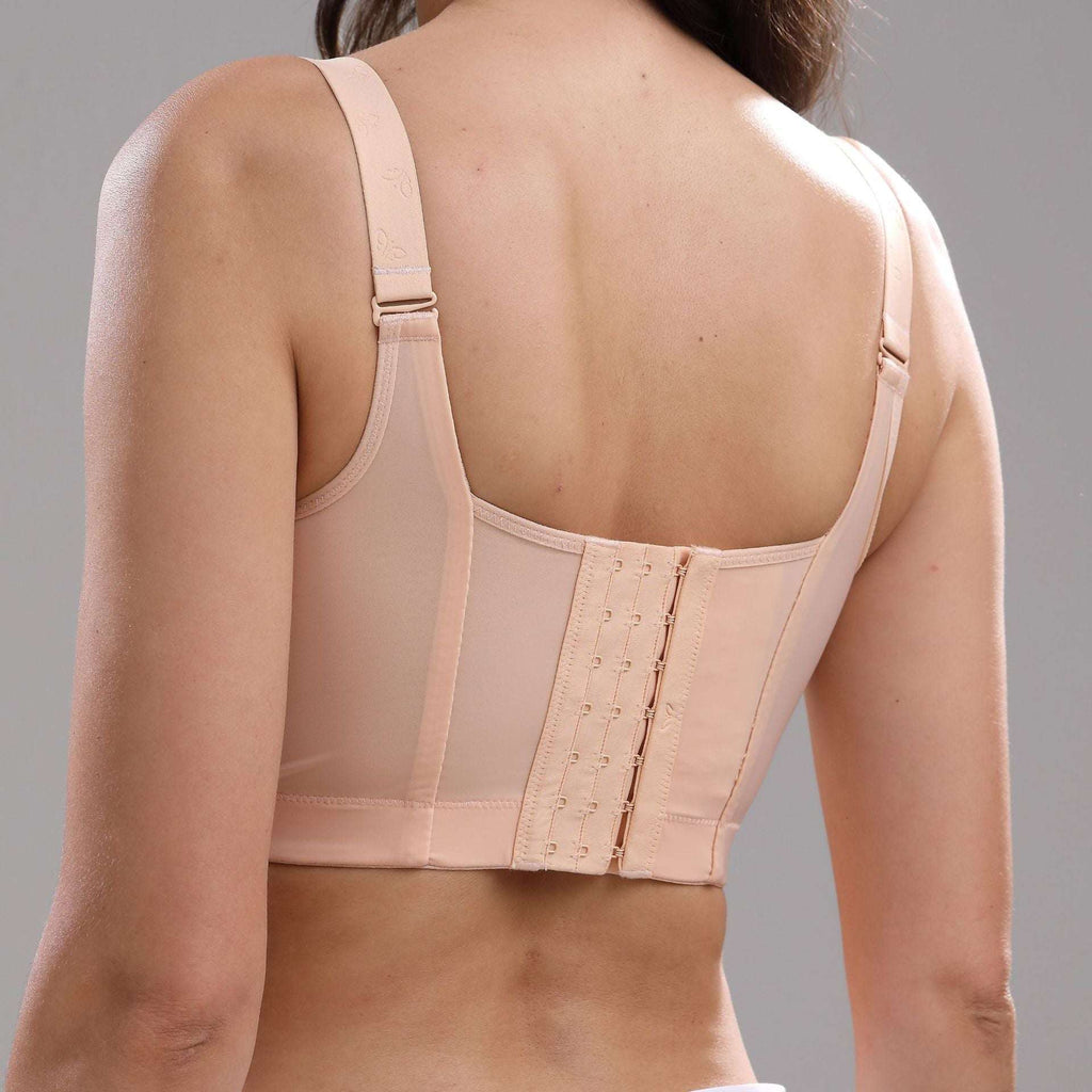 Light pink full-cup plus-size bra with wide back straps and front hook closure