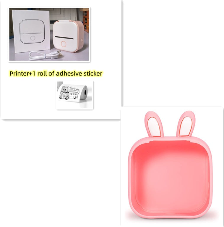 Portable mini thermal label printer with red-pink body and printer paper rolls