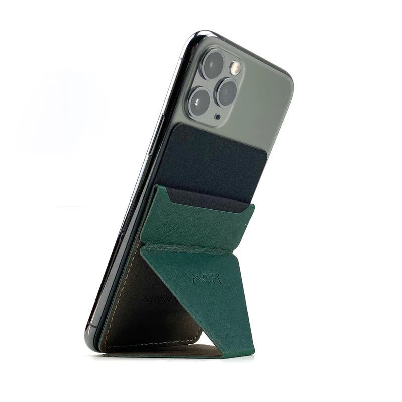 Mobile phone stand with green fabric wedge, propping a phone in portrait view
