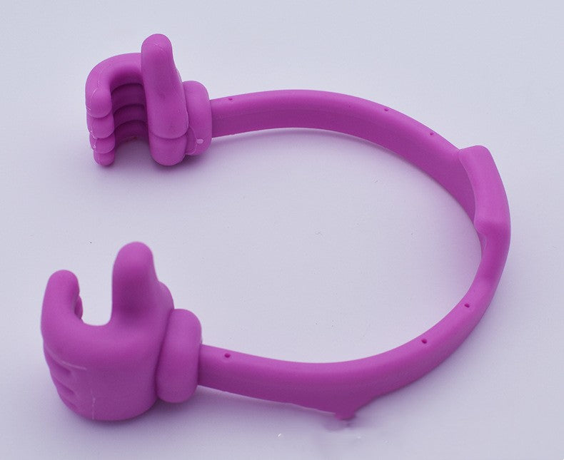 Pink thumb phone and tablet stand with two finger-grip supports along the loop.