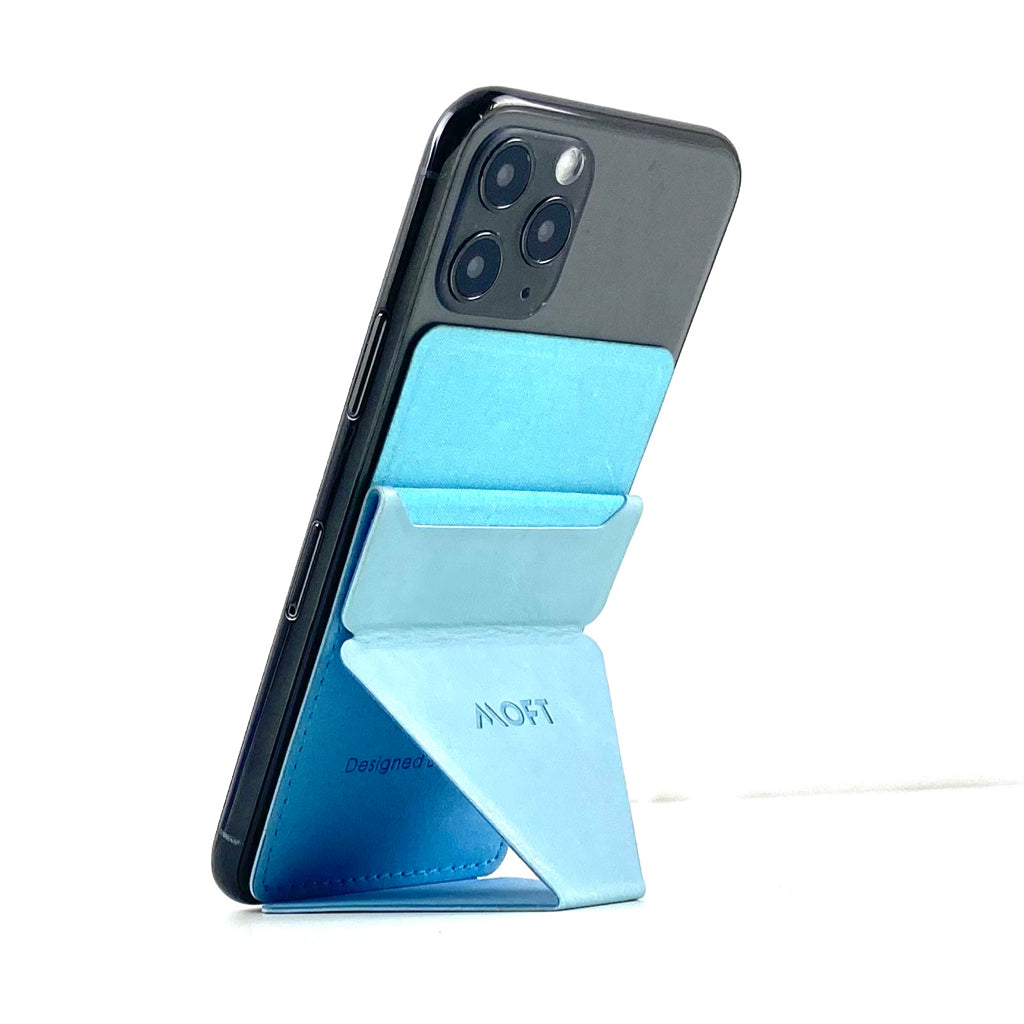 Mobile phone folding stand with light blue fabric insert