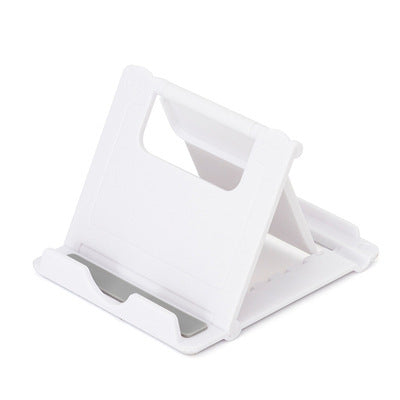 White folding phone stand with angled cradle and stabilizing base
