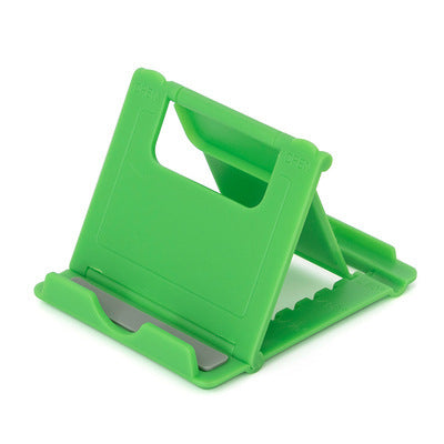 Green folding phone stand, angled cradle with stabilizing base