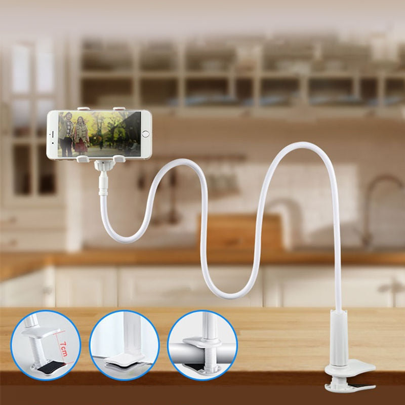 White mobile phone desktop stand with U-shaped cable and spring-style base.