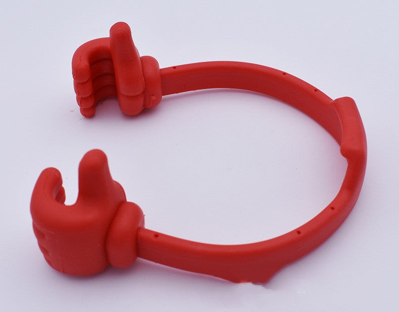 Red thumb phone and tablet stand with two finger-grip supports along the loop.