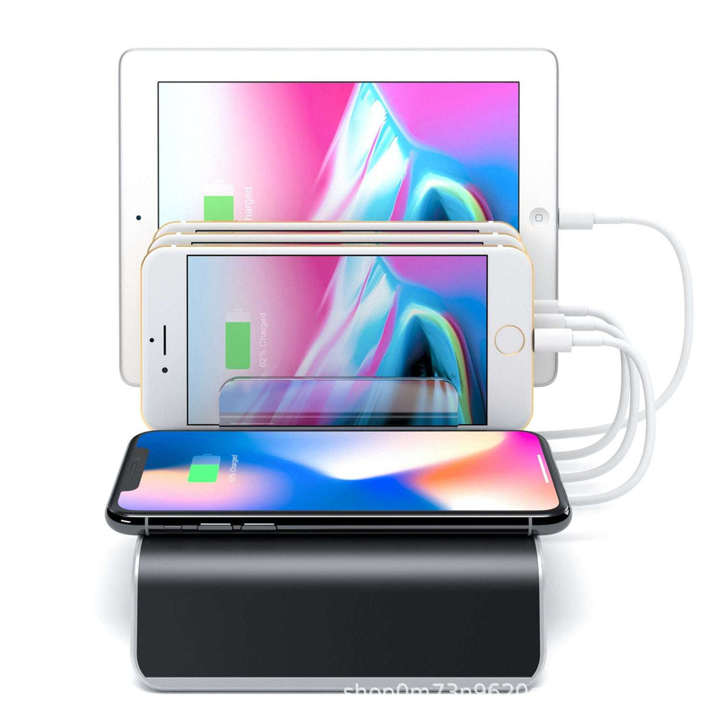 Tablet charging stand base with black cradle, charging cables, and two devices docked