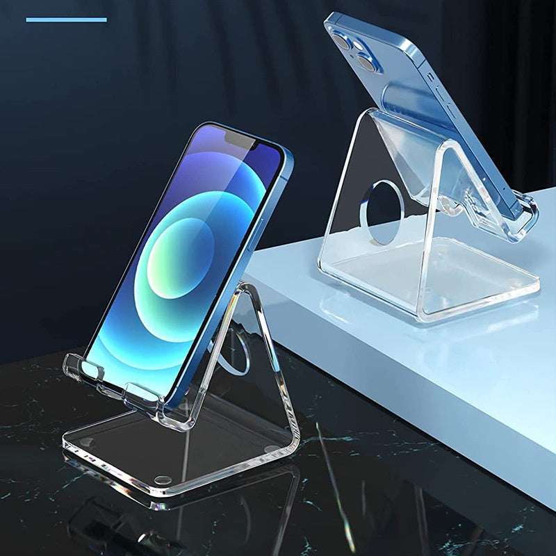 Transparent acrylic mobile phone stand with open cradle, phone propped upright