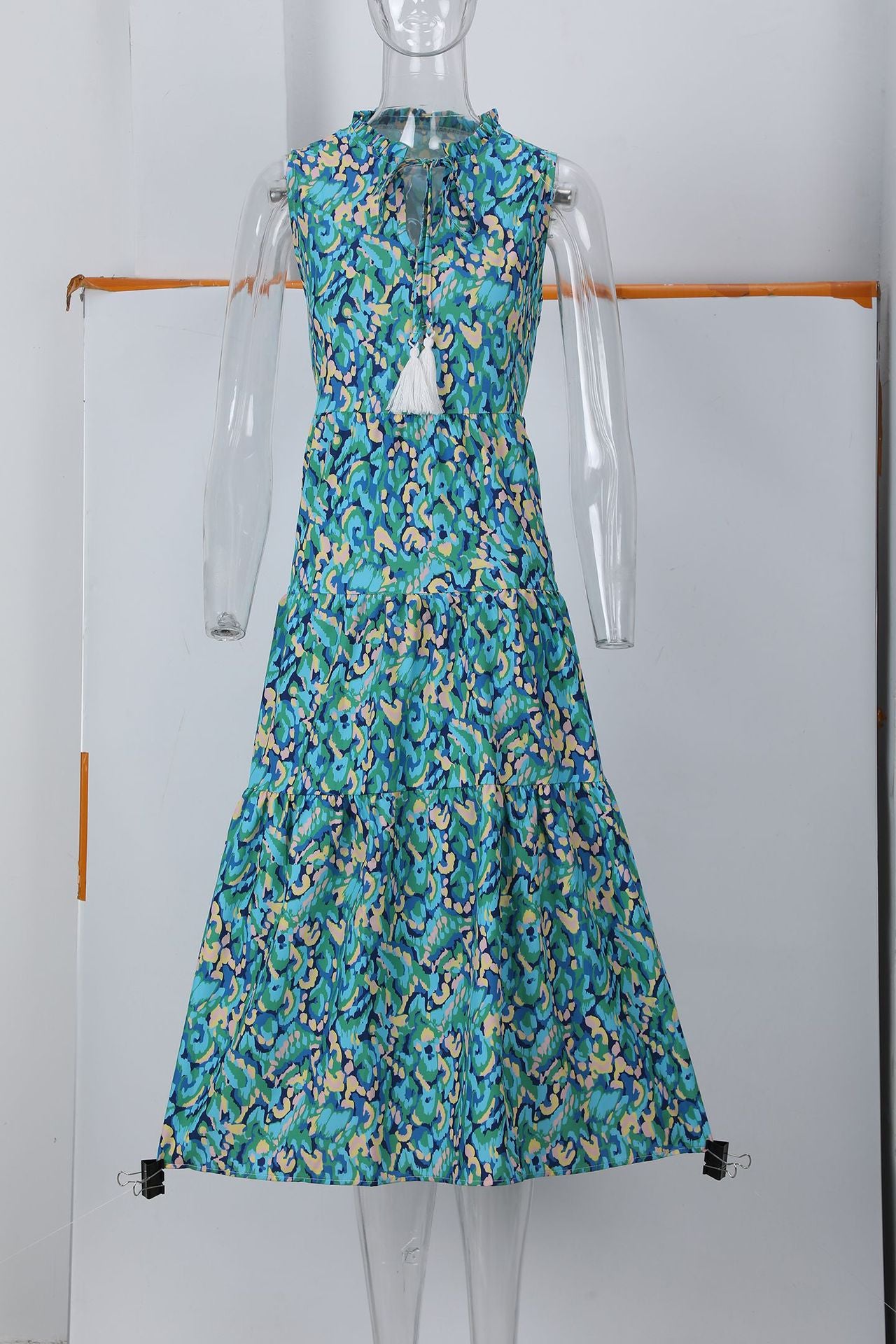 Sleeveless V-neck abstract-print dress in teal with full skirt