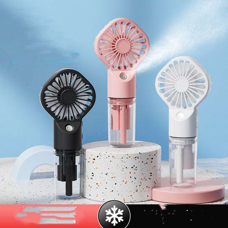 Portable mist humidifier fan in black, pink, and white with transparent mist chamber