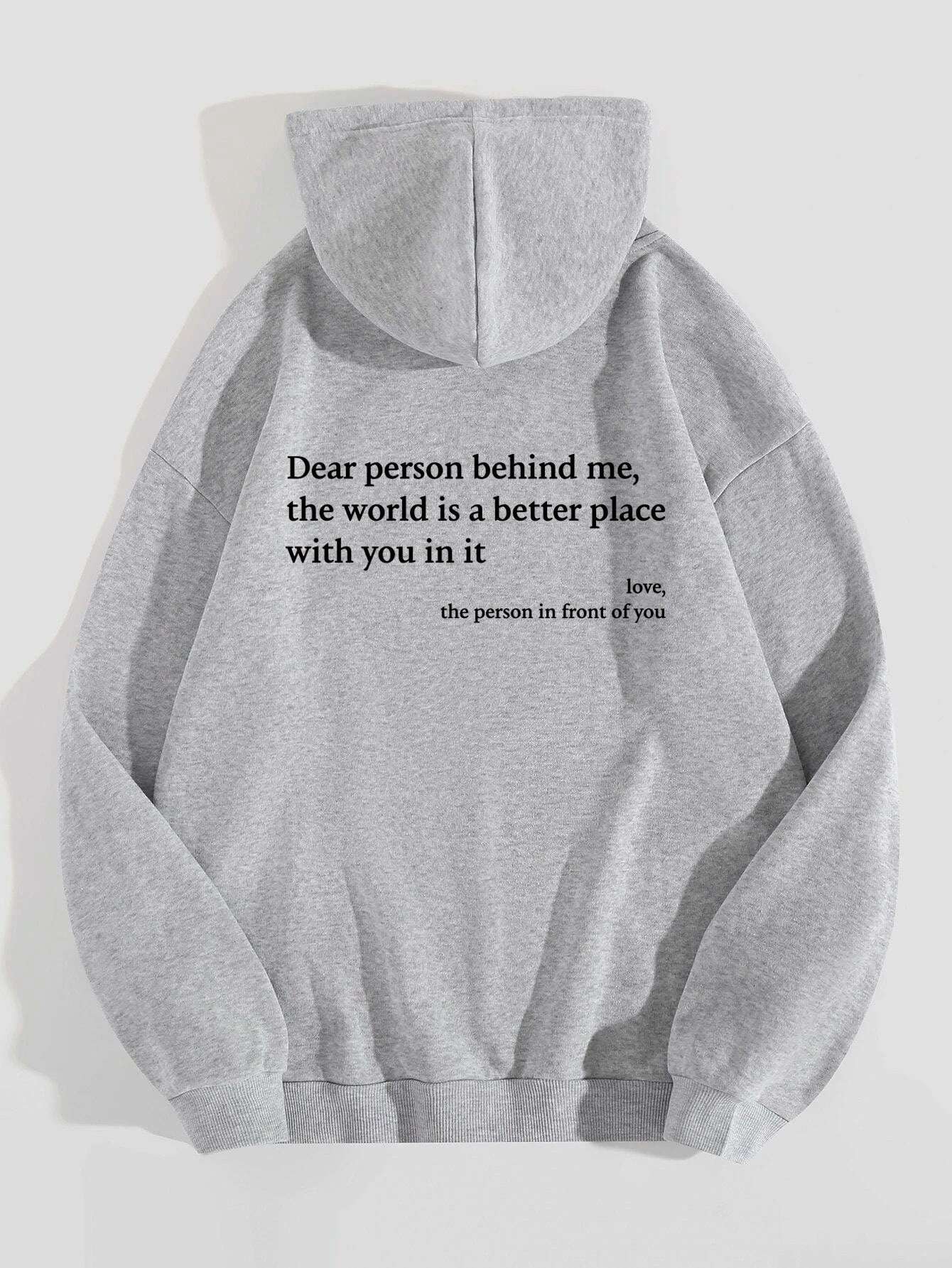 Gray plush hoodie with drawstring hood, kangaroo pocket, and letter print on back