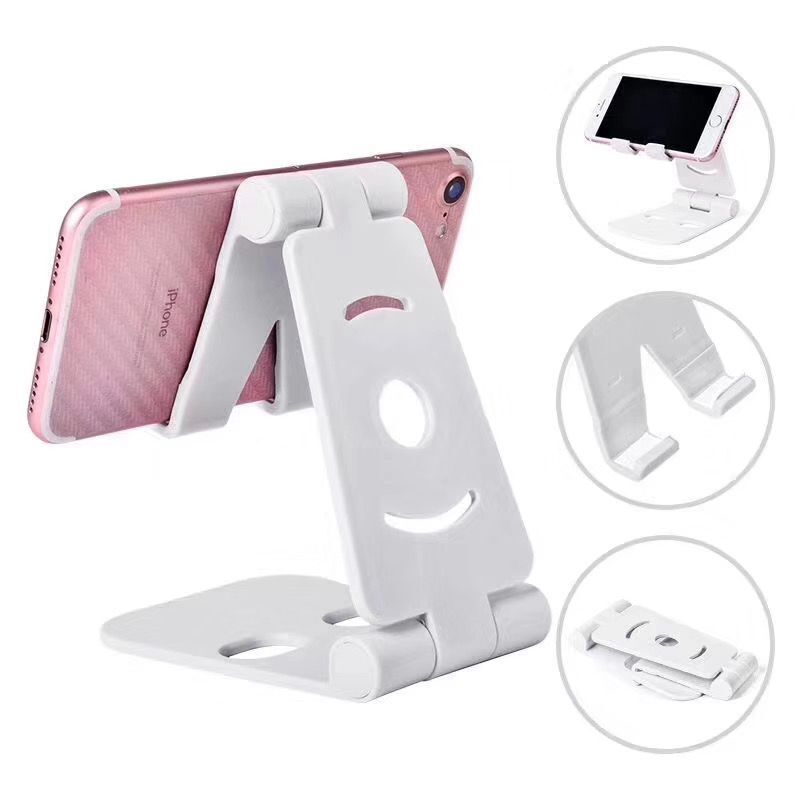 White dual-folding phone desktop stand with wide cradle and circular cutout