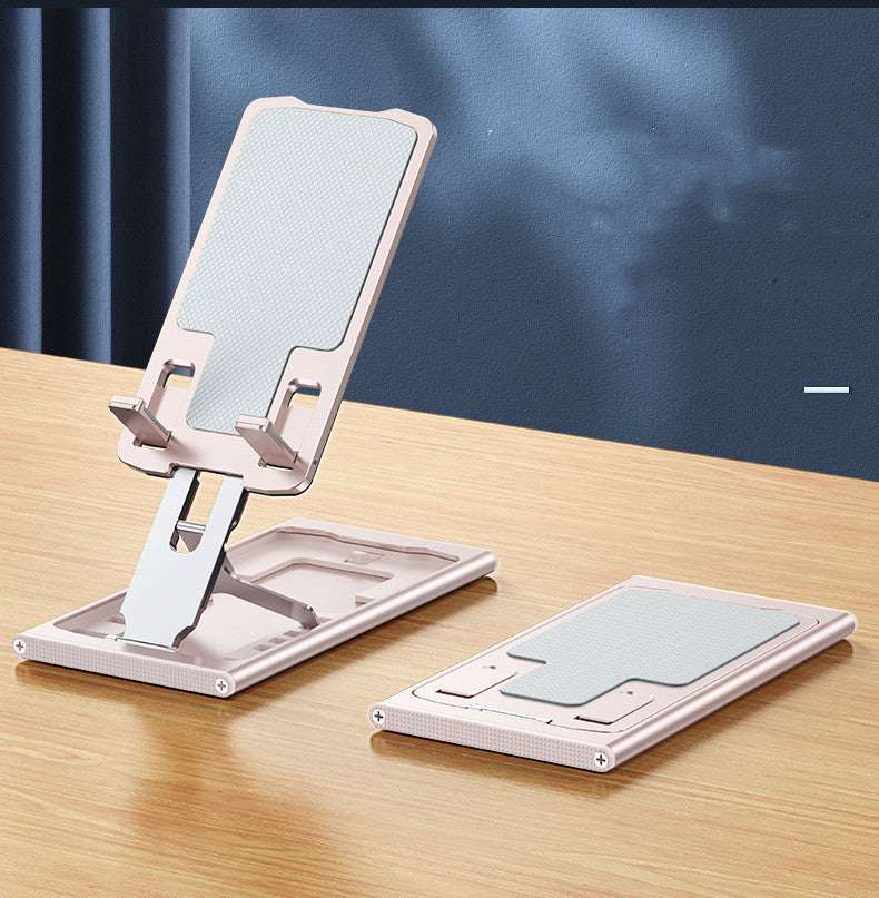 Foldable aluminum phone stand with slanted display cradle and flat storage base