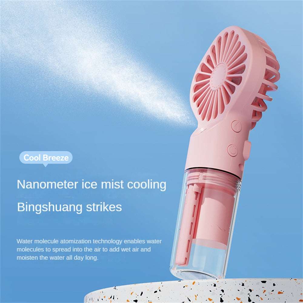 Pink portable mist humidifier fan with front grille and transparent water chamber