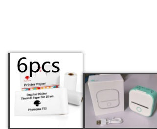 Mint thermal label printer beside white printer paper box and label rolls