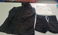 Fuzzy black lounge set with long-sleeve hooded top and drawstring shorts