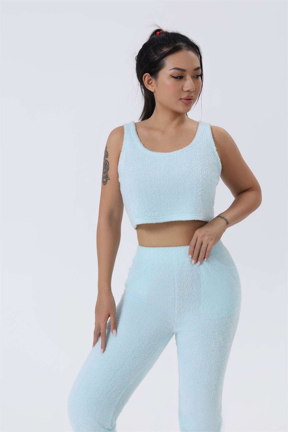 Light blue sleeveless crop pajama top and matching lounge pants set