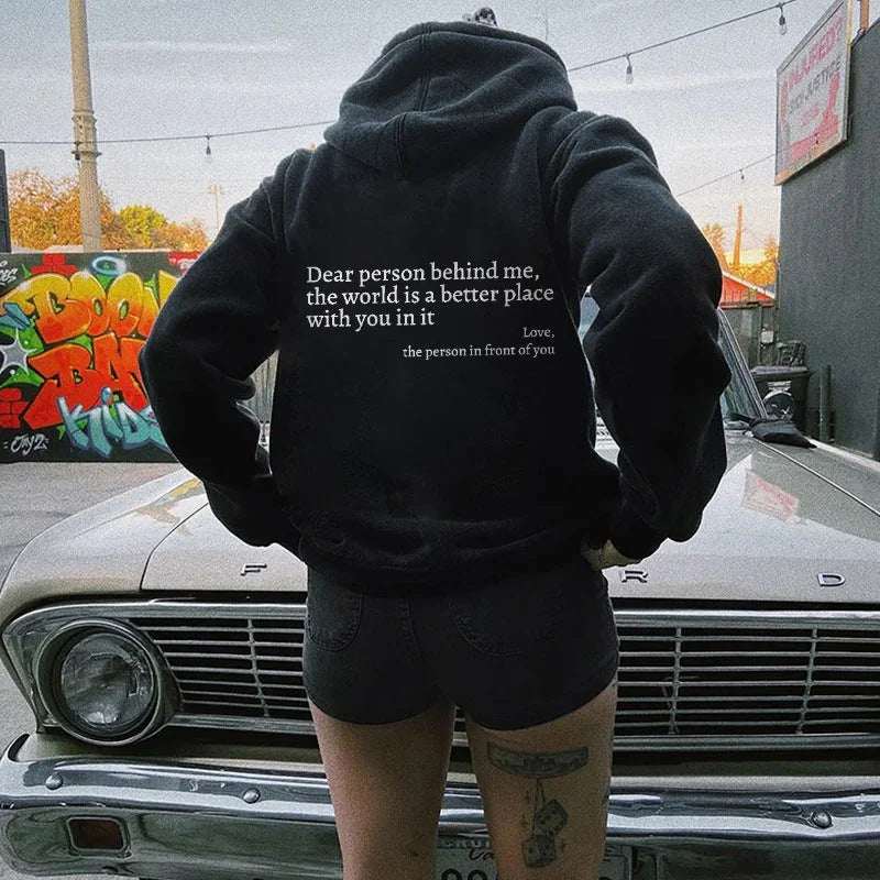 Black plush hoodie with drawstring hood and kangaroo pocket, letter print on back