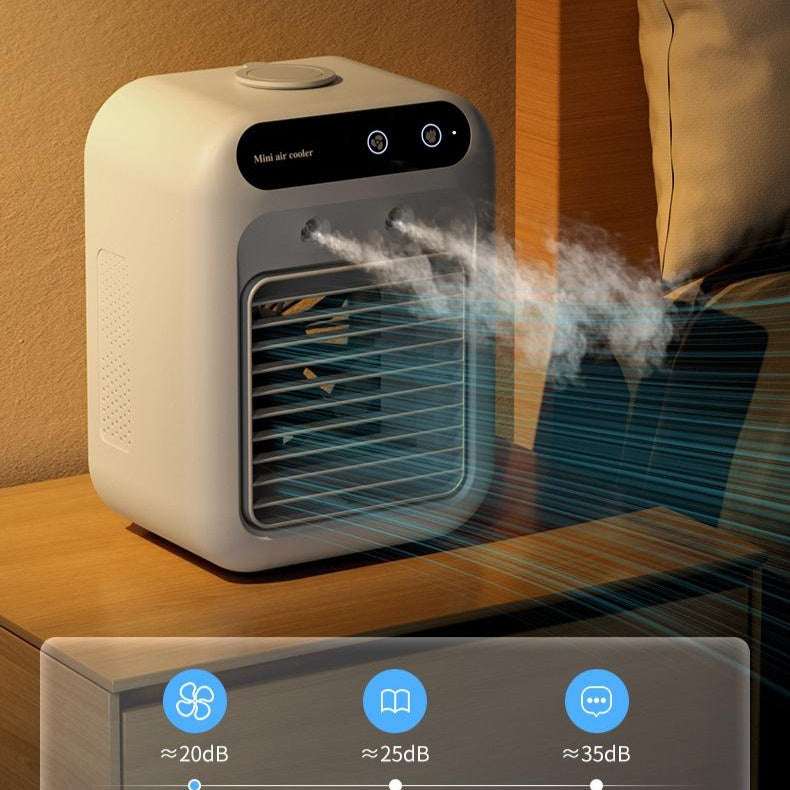 Ivory portable air cooler fan on table with front grille and misty airflow streams