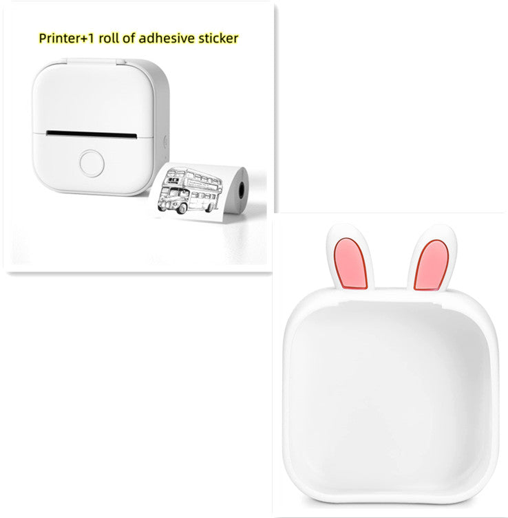 Portable mini thermal label printer with adhesive sticker roll, white body.