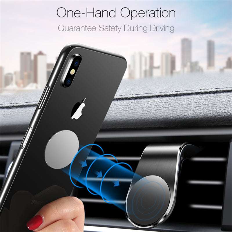 Black magnetic phone vent mount holding a smartphone with one-hand operation