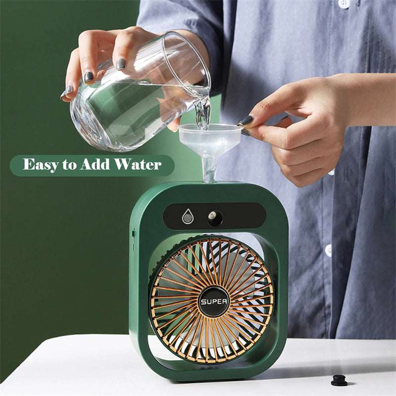 Portable misting air cooler fan, green body with water being poured into top