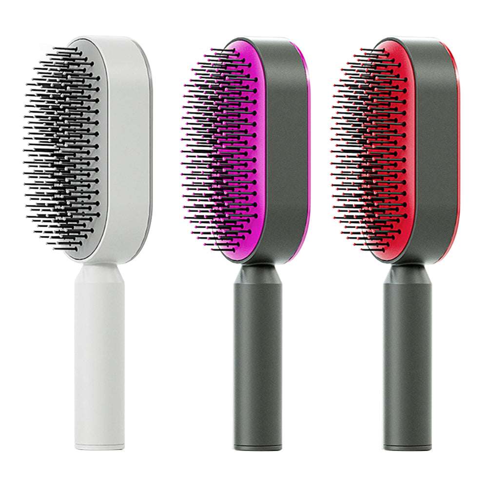 Self-cleaning hair brush trio: white, purple, and red pin pads with dark handles