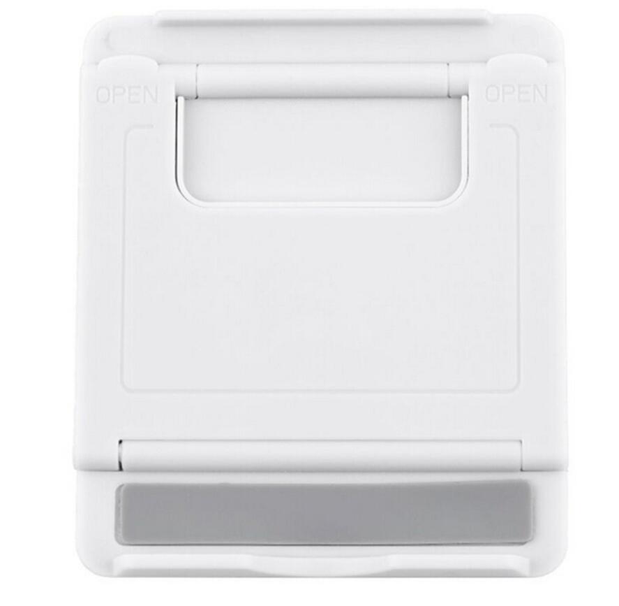 Foldable plastic tablet stand in white with open cradle and support base