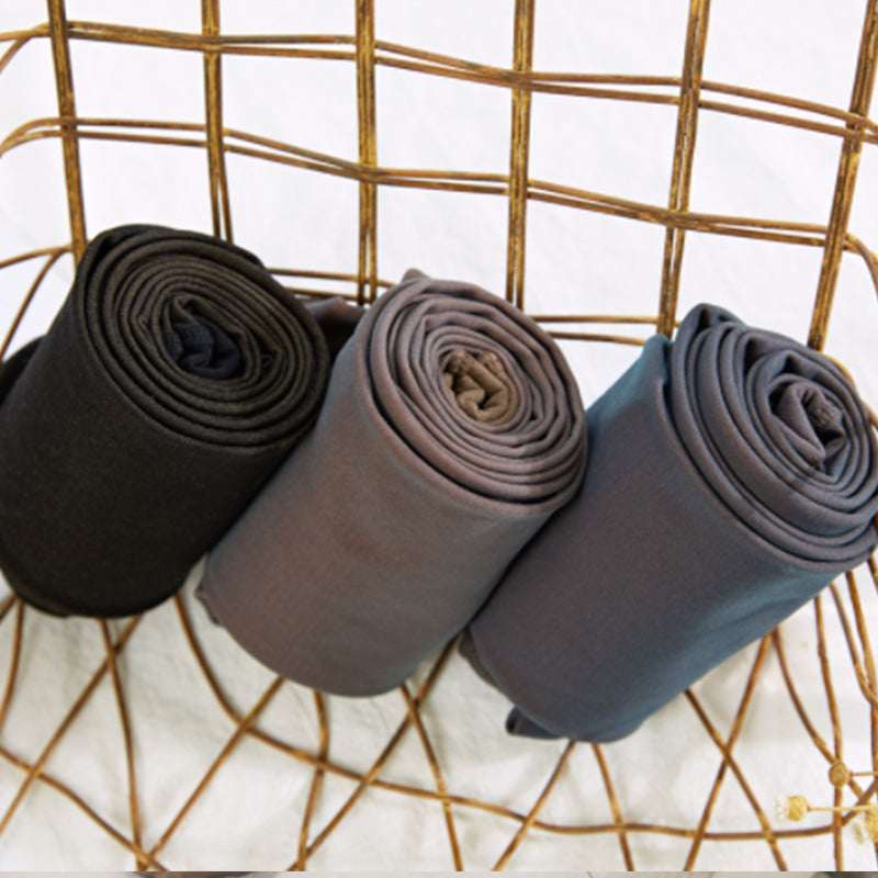 Fleece-lined thermal tights rolls in black, taupe, and blue-grey shades