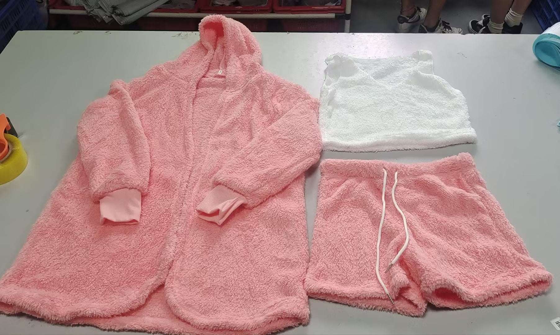 Fuzzy pink lounge set with long-sleeve hooded top and drawstring shorts