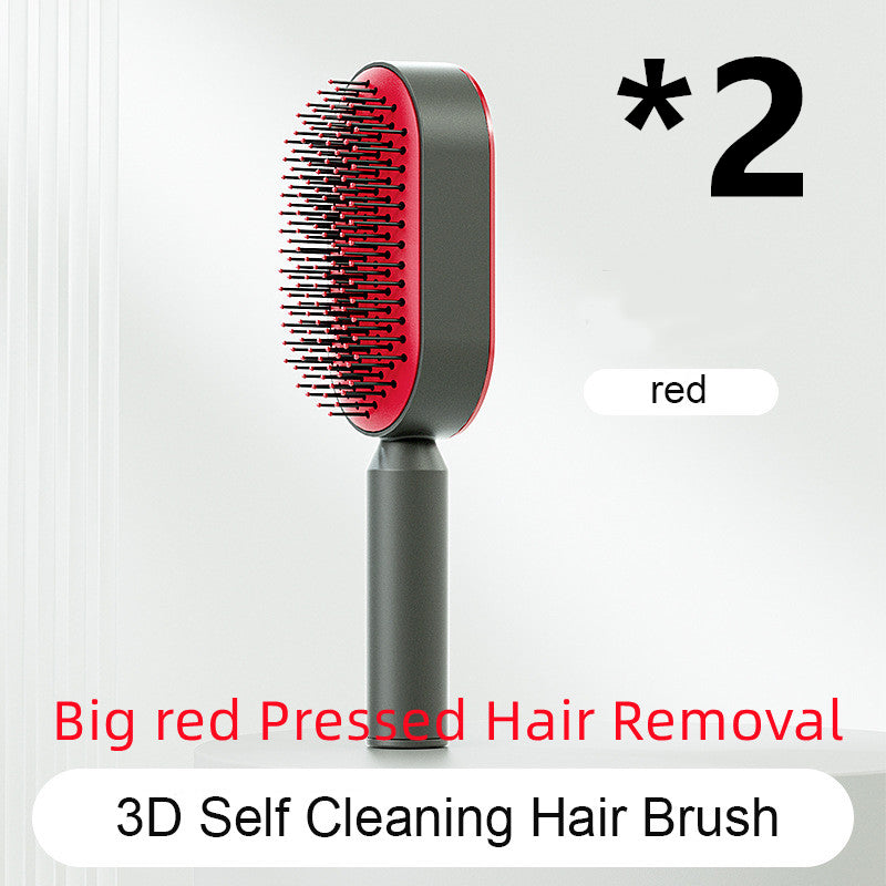 Self-cleaning hair brush with red-tipped bristles on dark handle and red base