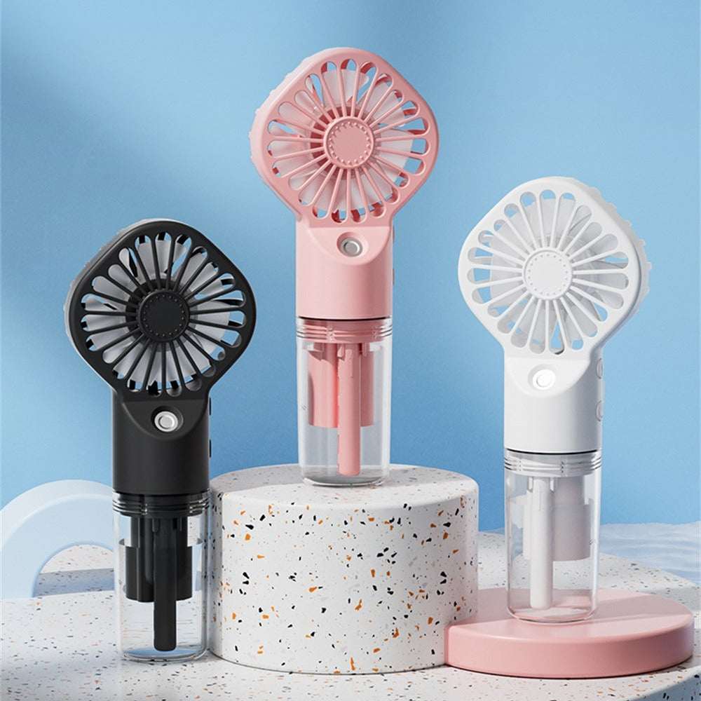 Portable mist humidifier fan in black, pink, and white with base and grille
