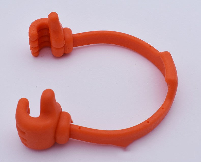 Orange thumb phone and tablet stand with two finger-grip supports along the loop.