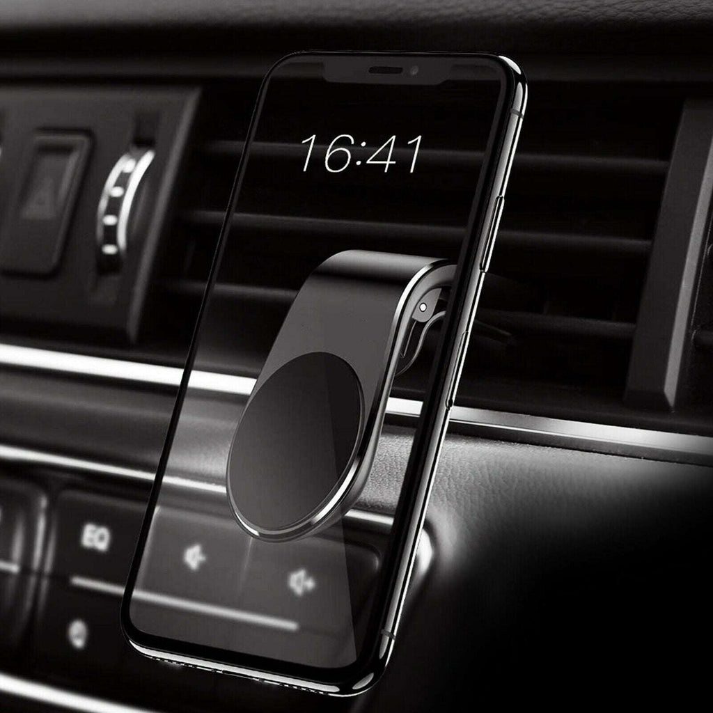 Black magnetic phone vent mount attached to car air vent, smartphone hanging