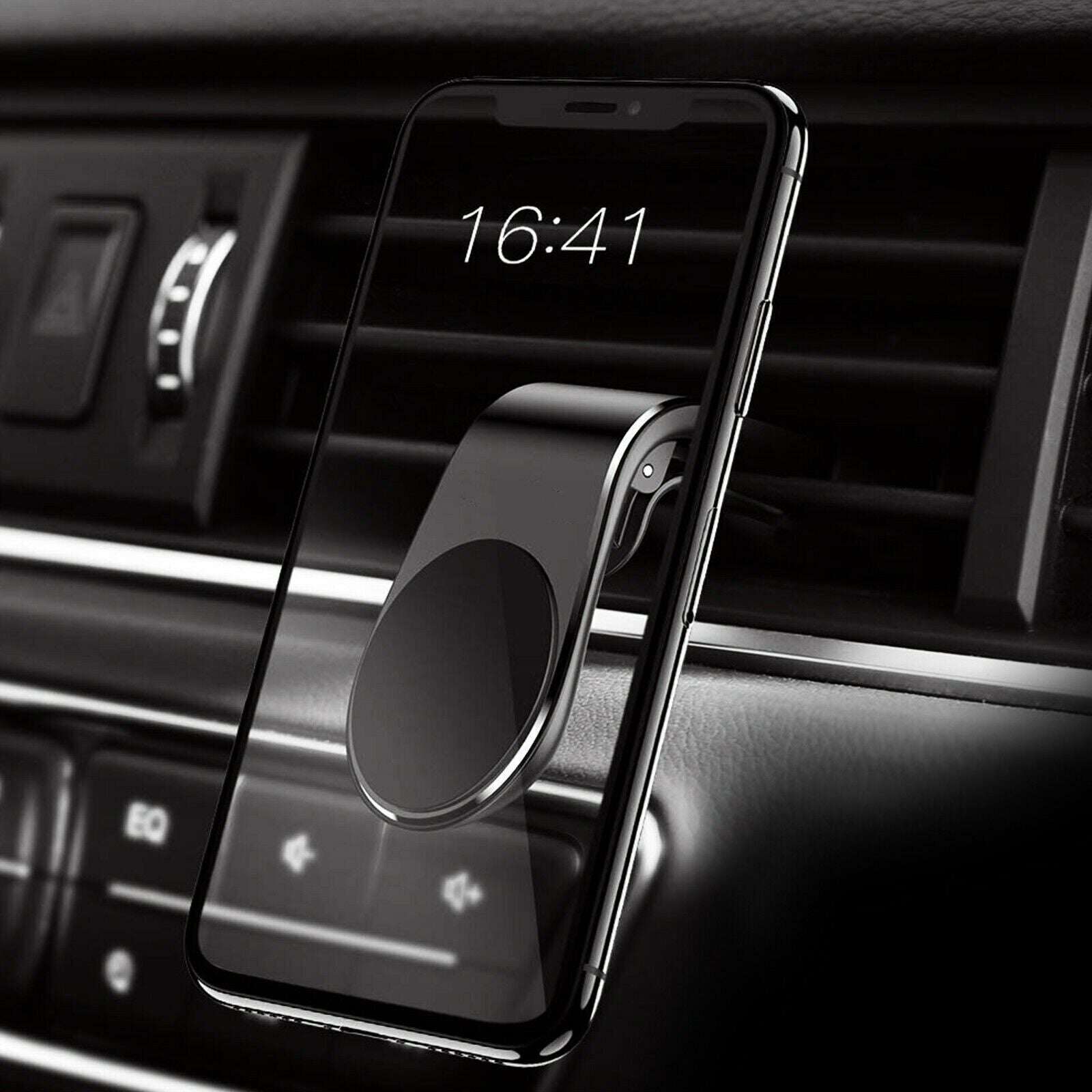 Black magnetic phone vent mount attached to car air vent, smartphone hanging
