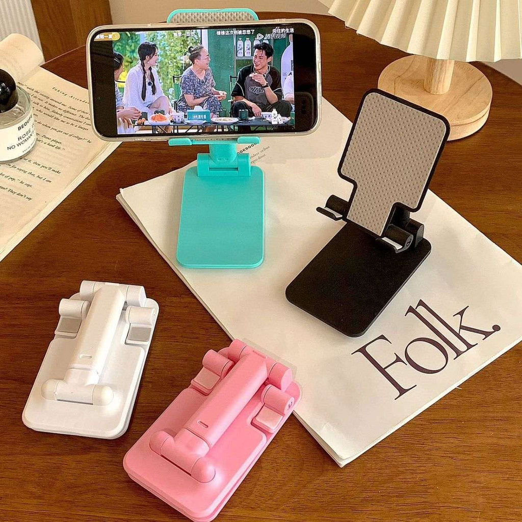 Folding mobile phone stand set with pink, teal, black, and white stands