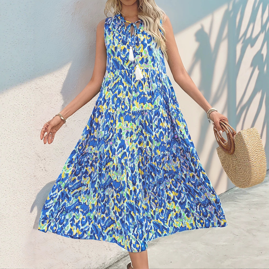 Sleeveless V-neck tassel abstract-print dress, blue and yellow tiered midi skirt