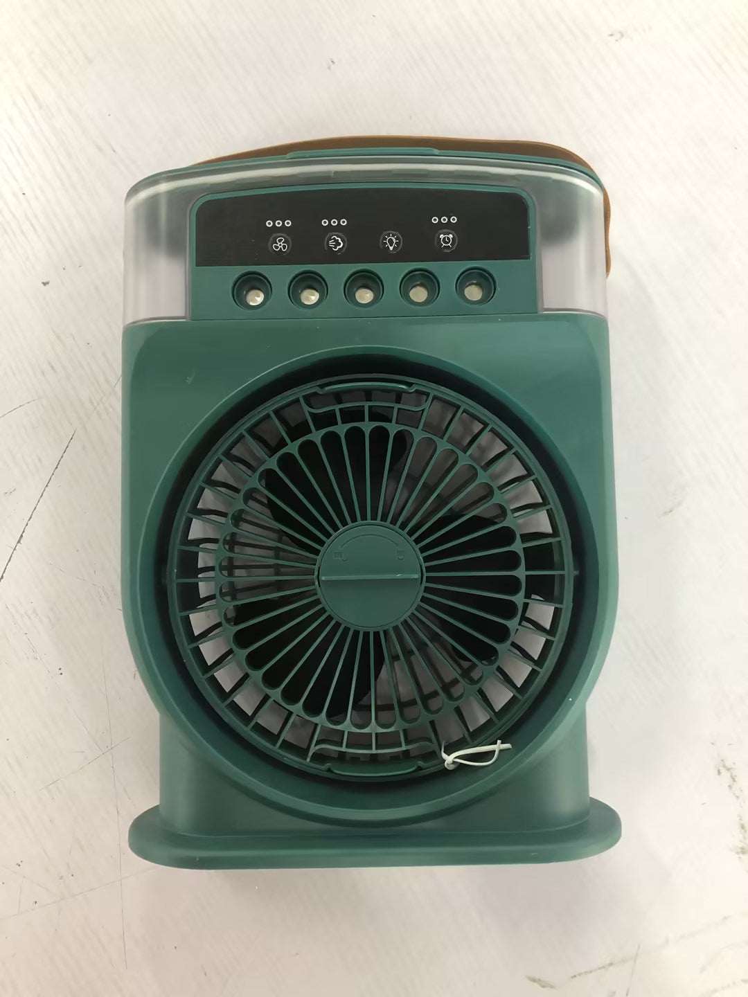 Portable USB air conditioner cooling fan in green, close-up of front grille and control buttons