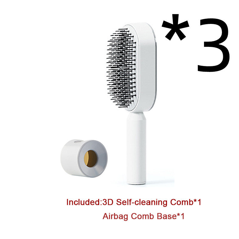 Self-cleaning hair brush with white oval comb head, white handle, and base