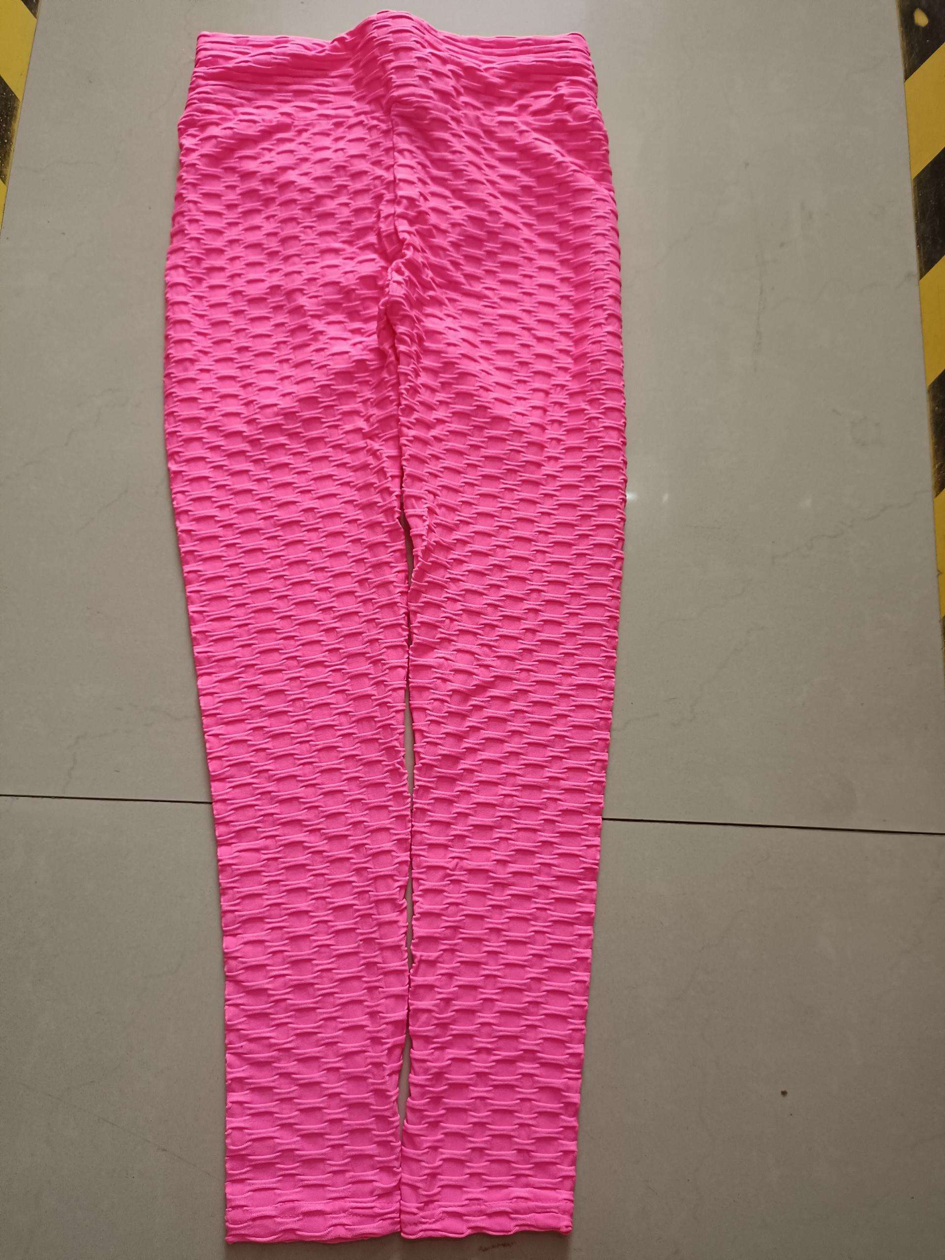 Bright pink scrunch leggings with textured booty-lifting pattern, no pocket