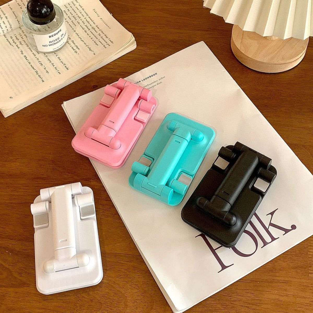 Folding mobile phone stand set with pink, teal, and black bases