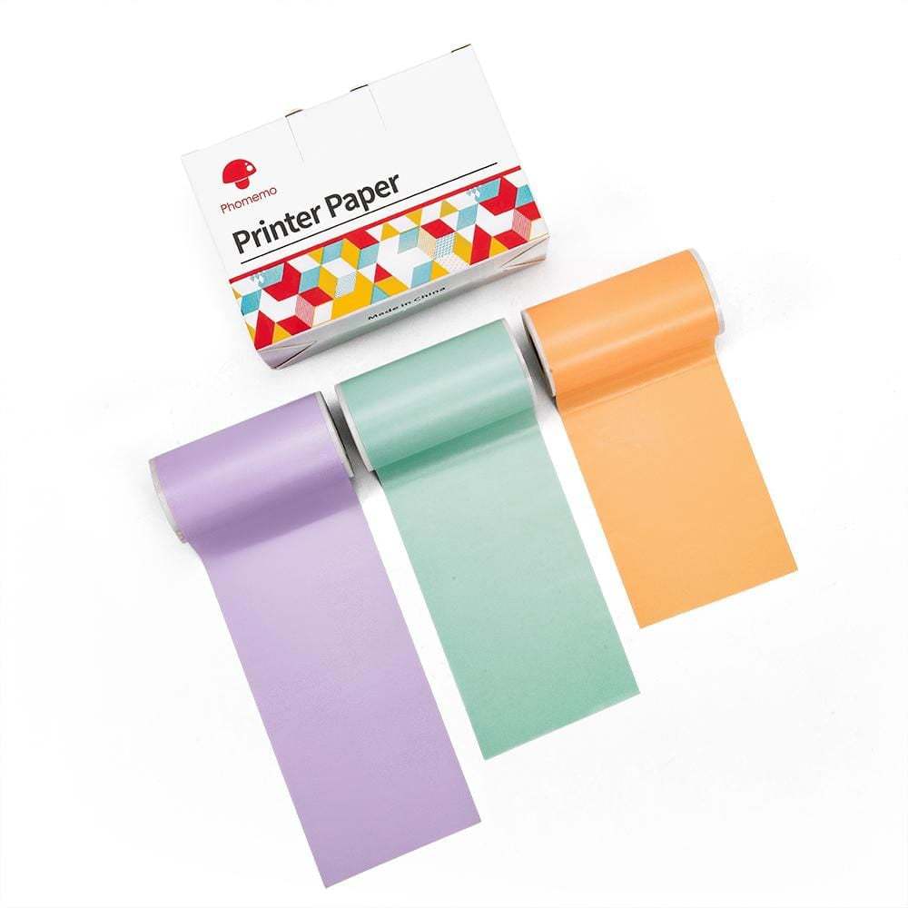 Color thermal label printer paper rolls in purple, green, and orange