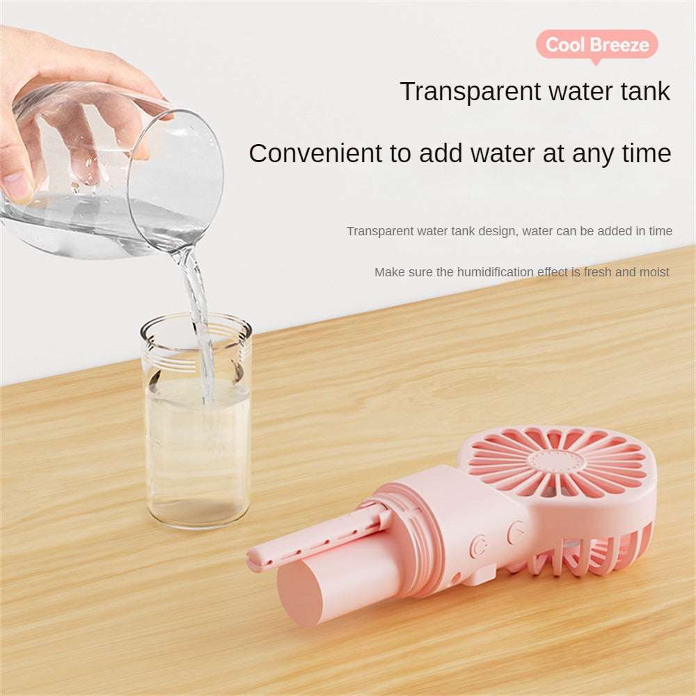 Pink portable mist humidifier fan with transparent water tank and refill opening