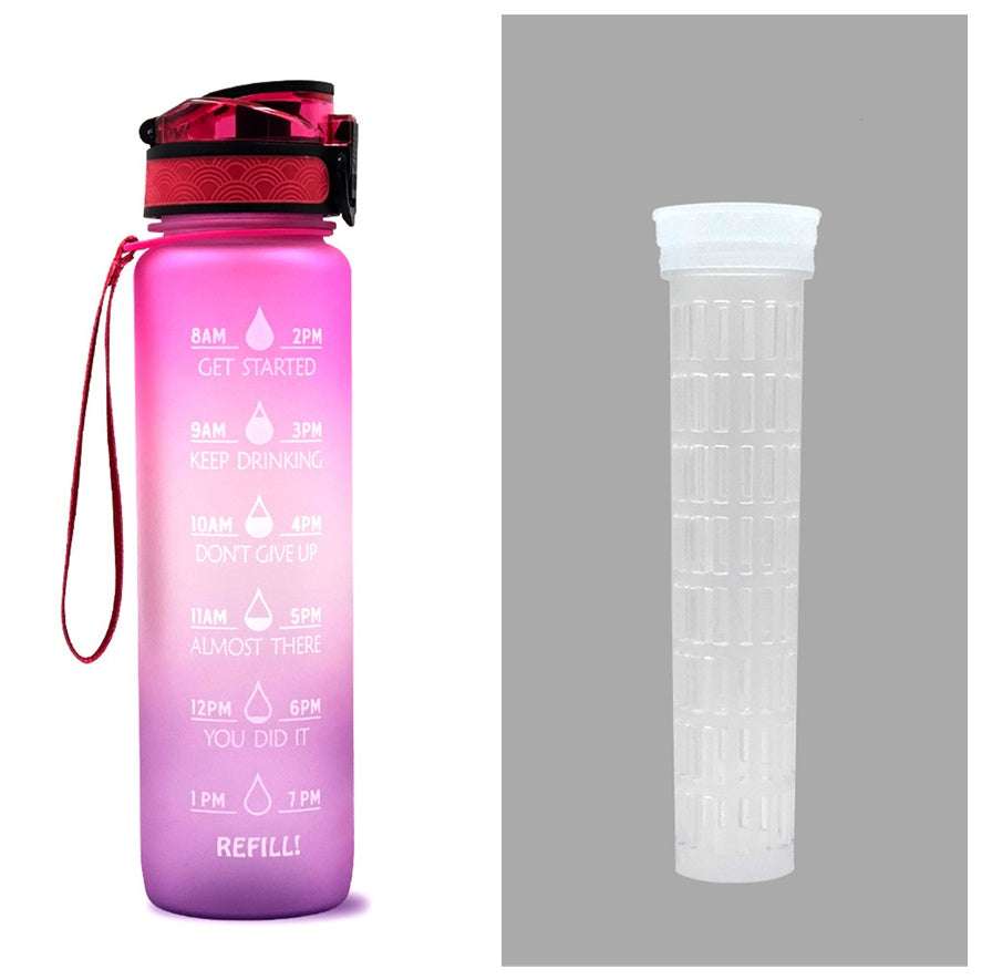 Motivational water bottle with time markers, pink-to-purple gradient body, flip lid, carry loop