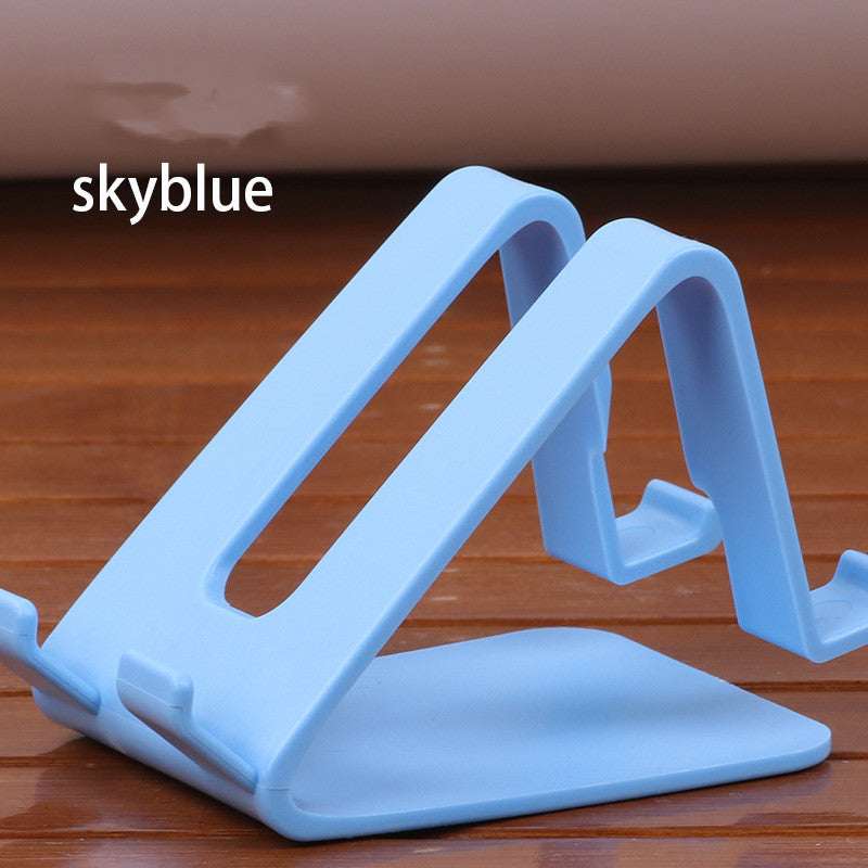 Sky blue universal phone and tablet stand with front cradle and grip tabs