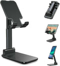 Black desktop phone and tablet stand shown with multiple viewing angles