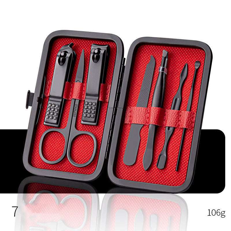 Red nail grooming tool set case with clippers, nail scissors, tweezers, and files